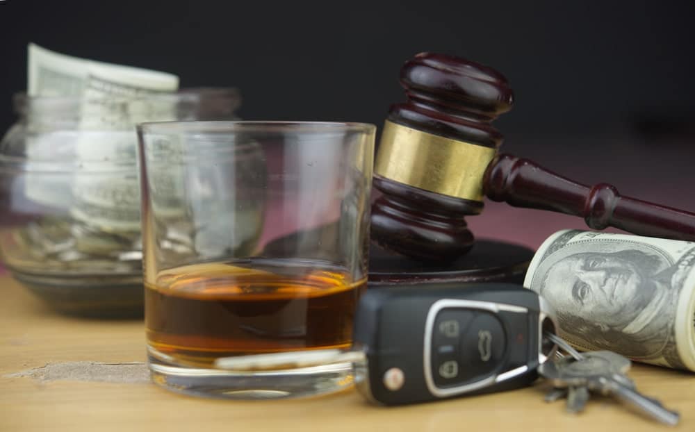 Glass Of Alcohol, Car Keys And A Gavel